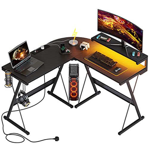 Bestier Gaming Tisch Eckschreibtisch mit 3 Steckdosen und 2 USB Ladeanschluss Gaming Schreibtisch L Form mit Monitorständer und LED 130x130 cm Pc Ecktisch Stabiler Stahlrahmen und einfache Montage